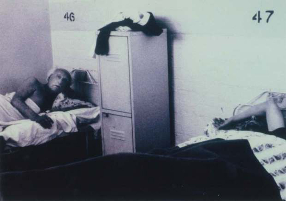 A photo of a room in the Wintringham Hostel. The room has two beds.
